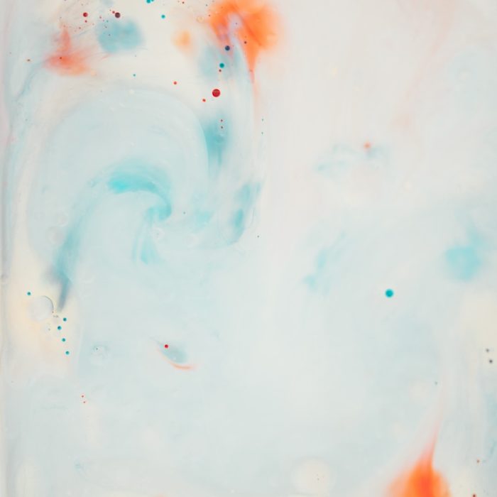 an abstract painting with orange and blue colors
